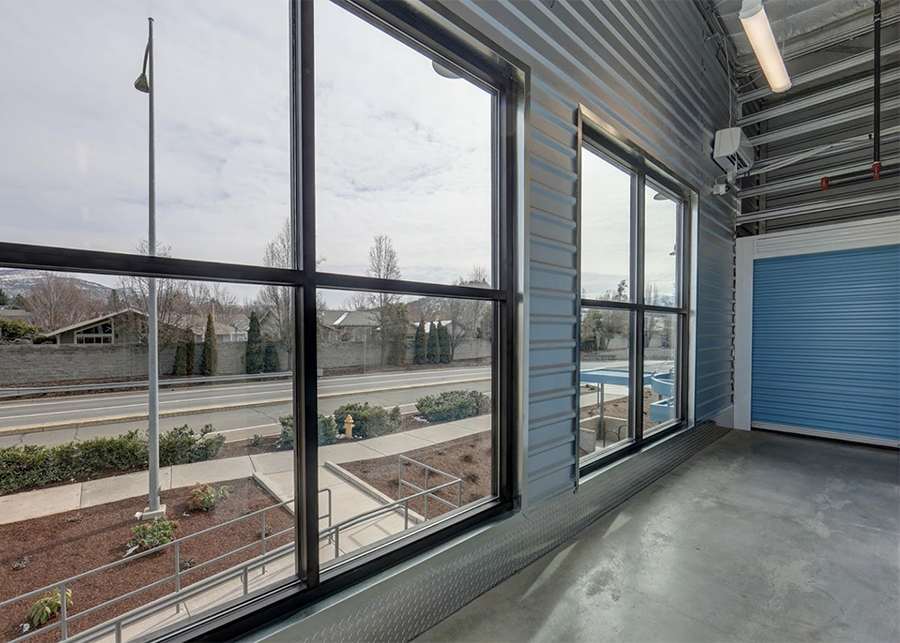 Large windows allow natural light to flood into the stainless steel halls of the storage buildings